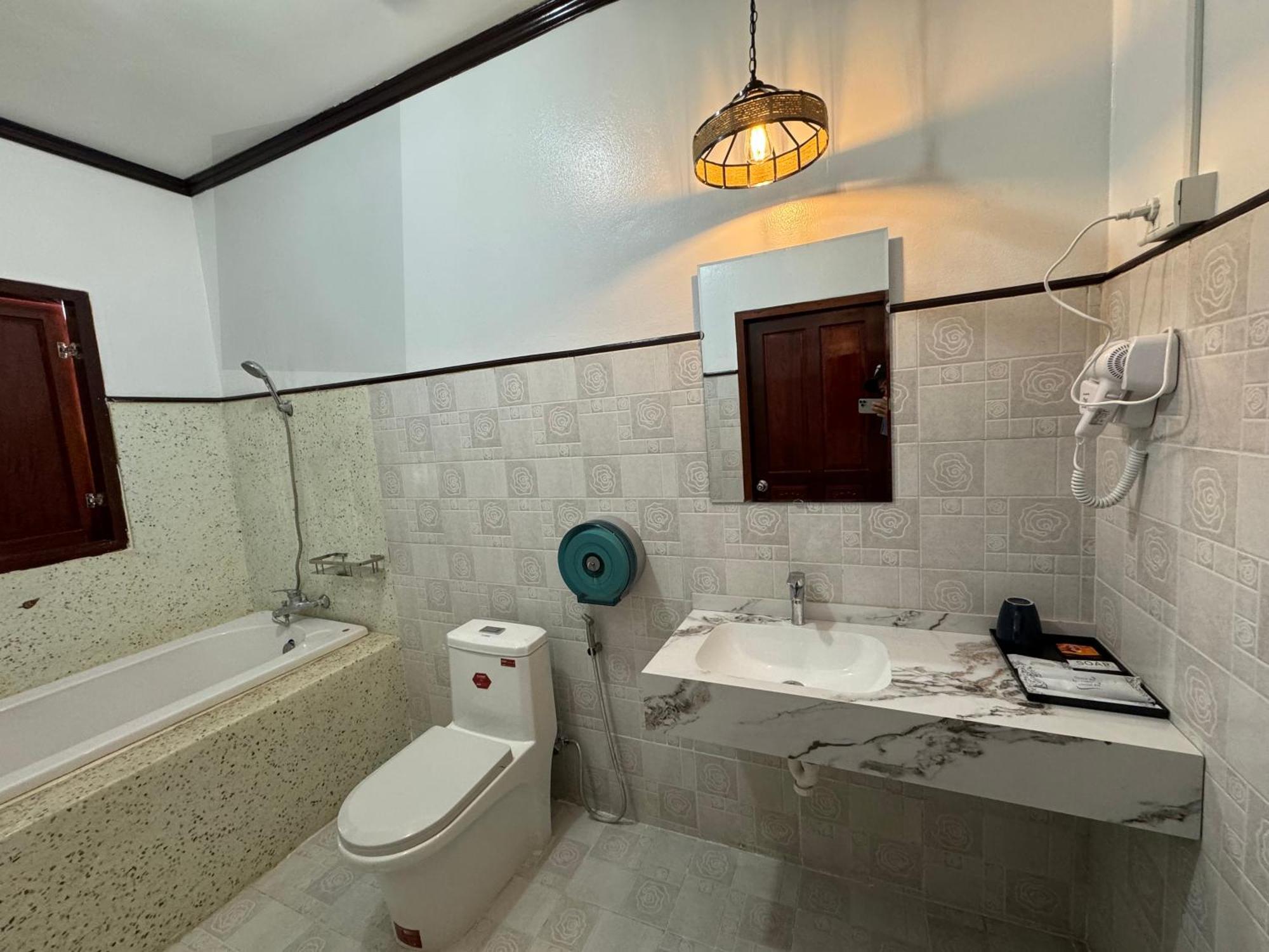 Win Hotel Ванг-Виенг Экстерьер фото