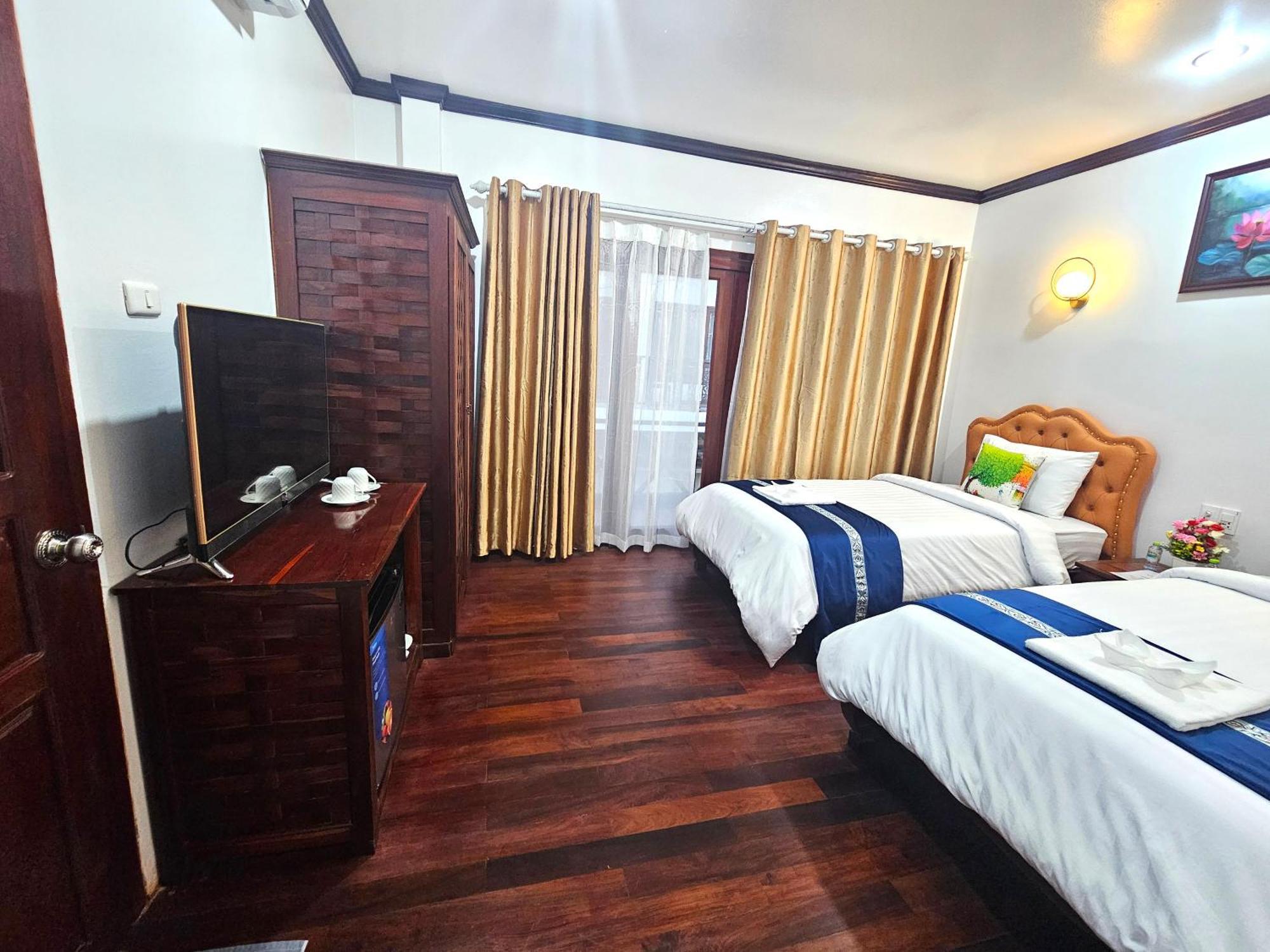 Win Hotel Ванг-Виенг Экстерьер фото