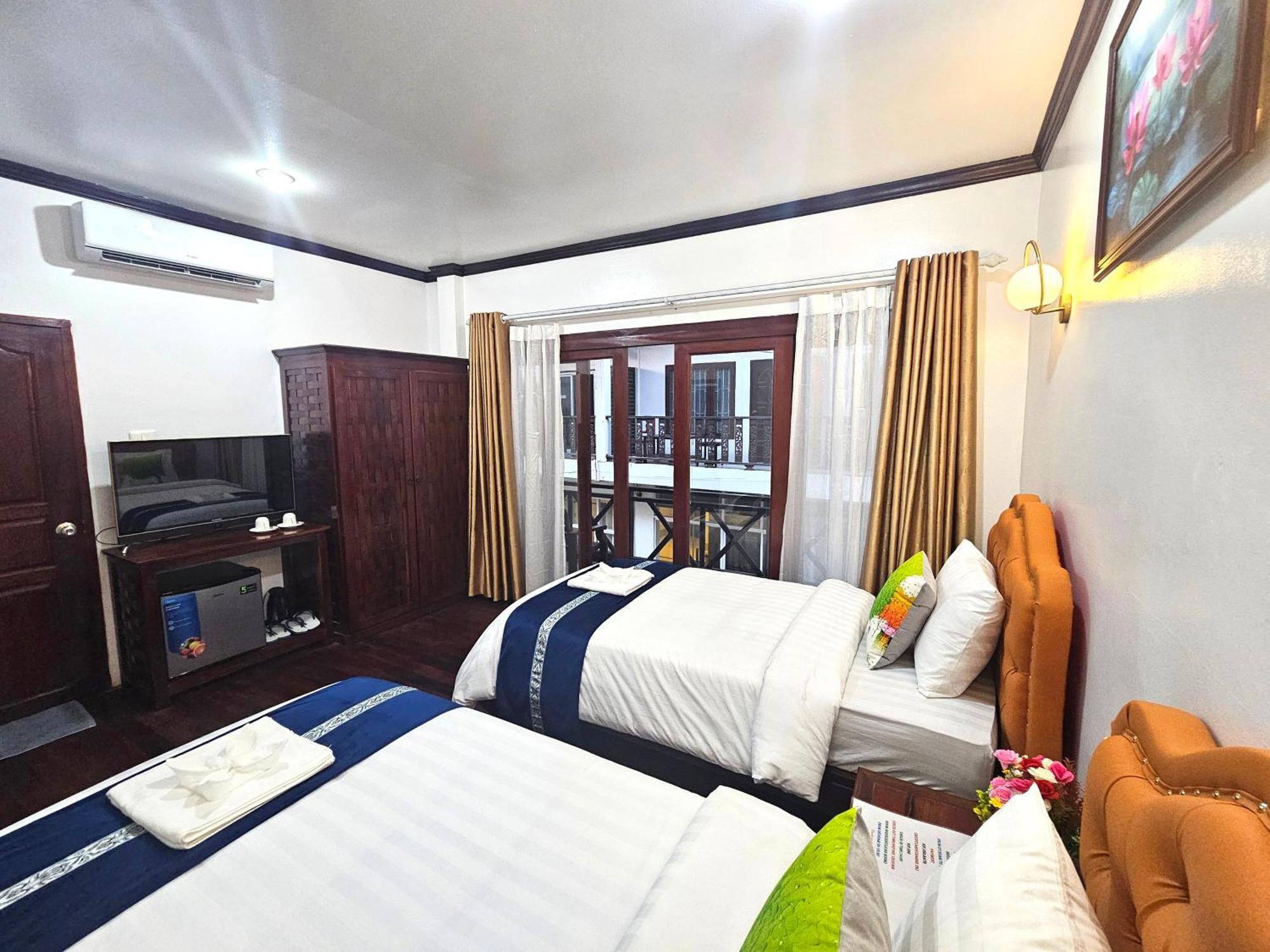 Win Hotel Ванг-Виенг Экстерьер фото