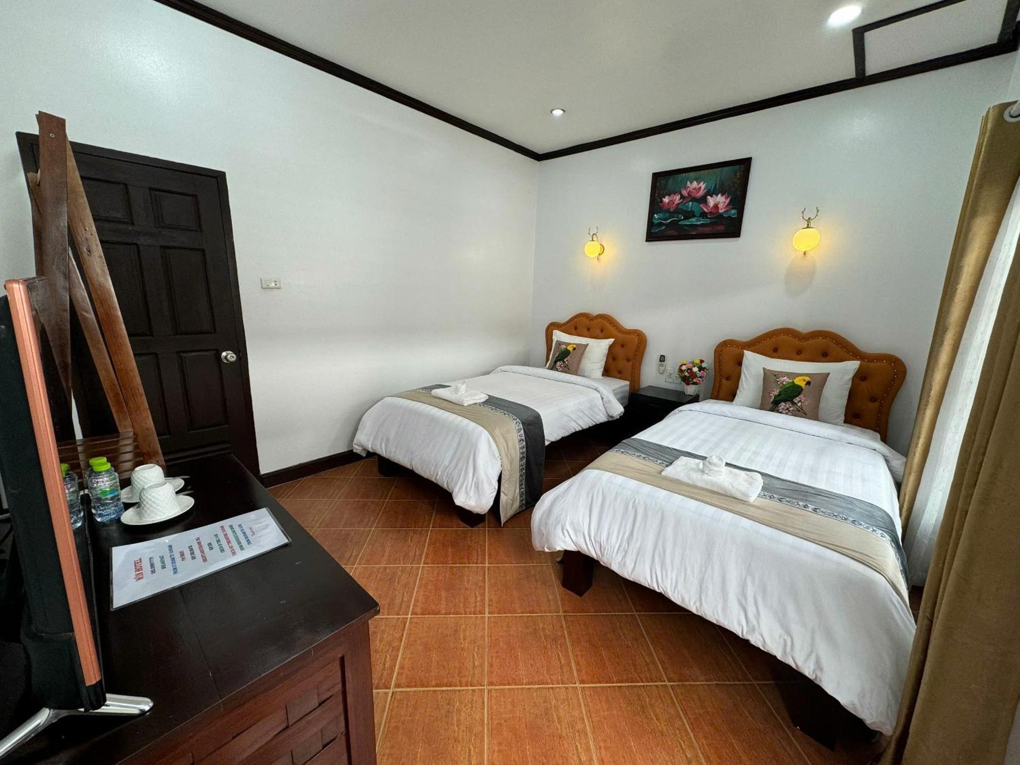 Win Hotel Ванг-Виенг Номер фото