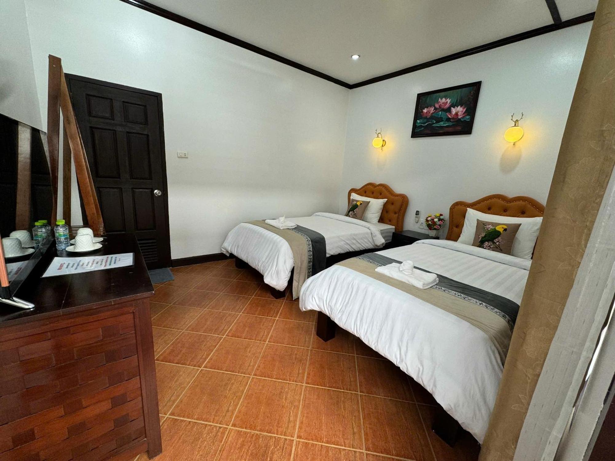 Win Hotel Ванг-Виенг Номер фото